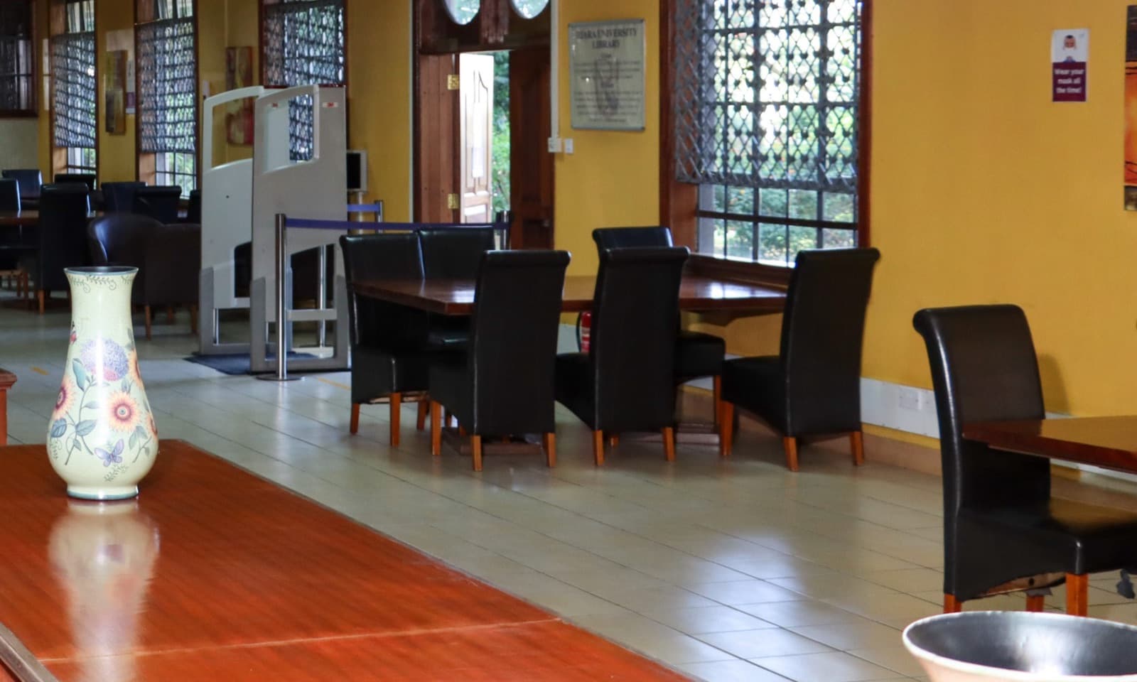 The entrance and reading tables of Riara University Library